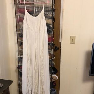 Long white dress with lots of lace details
